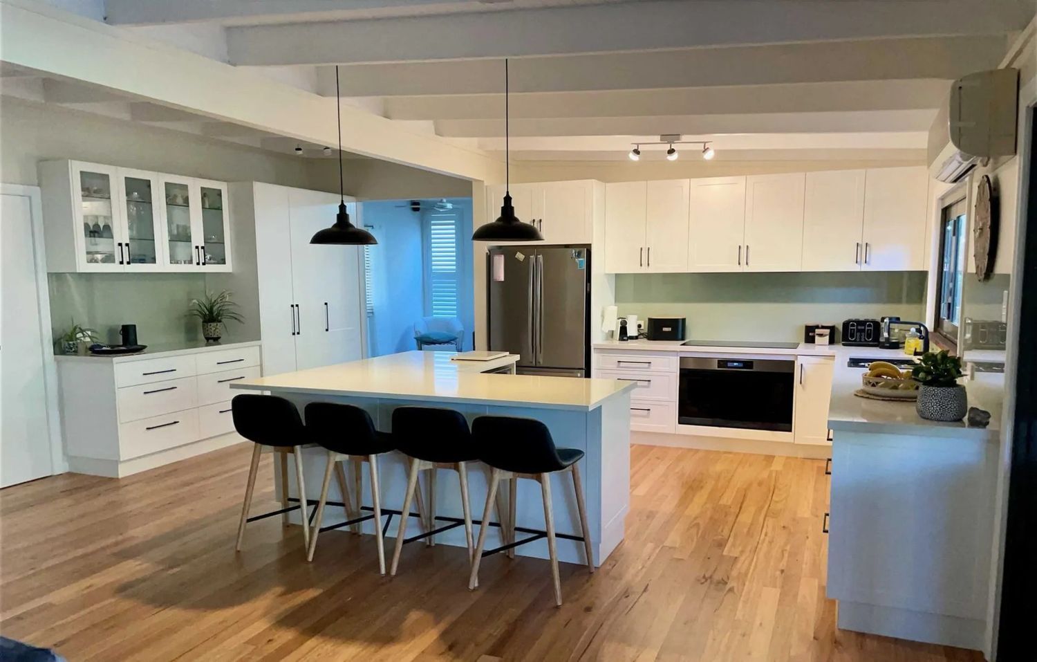 A Kitchen With White Cabinets — The Kitchen Centre In Tuggerah, NSW
