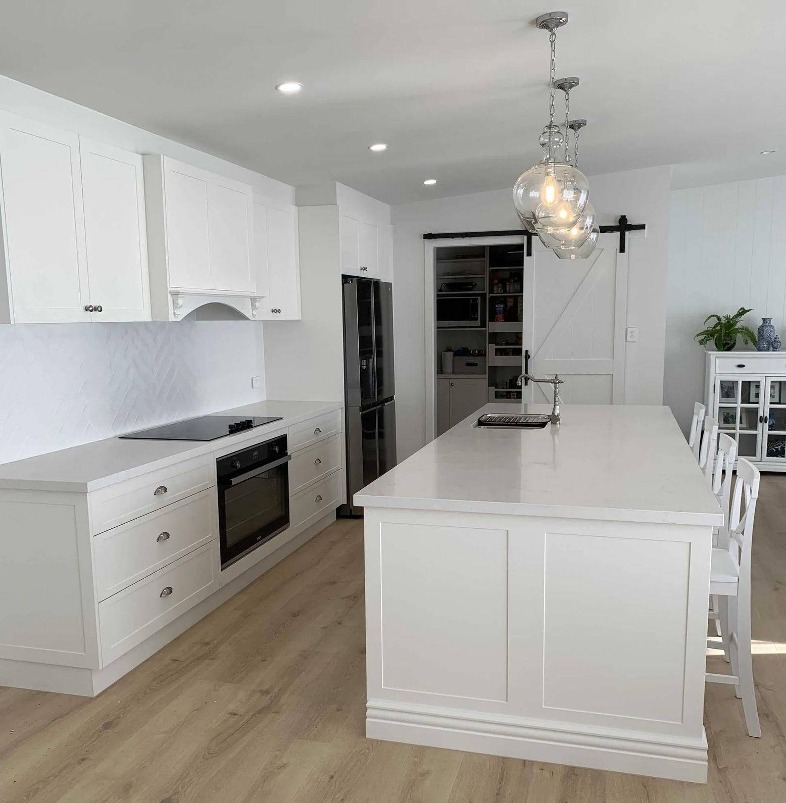A Kitchen With White Cabinets — The Kitchen Centre In Tuggerah, NSW