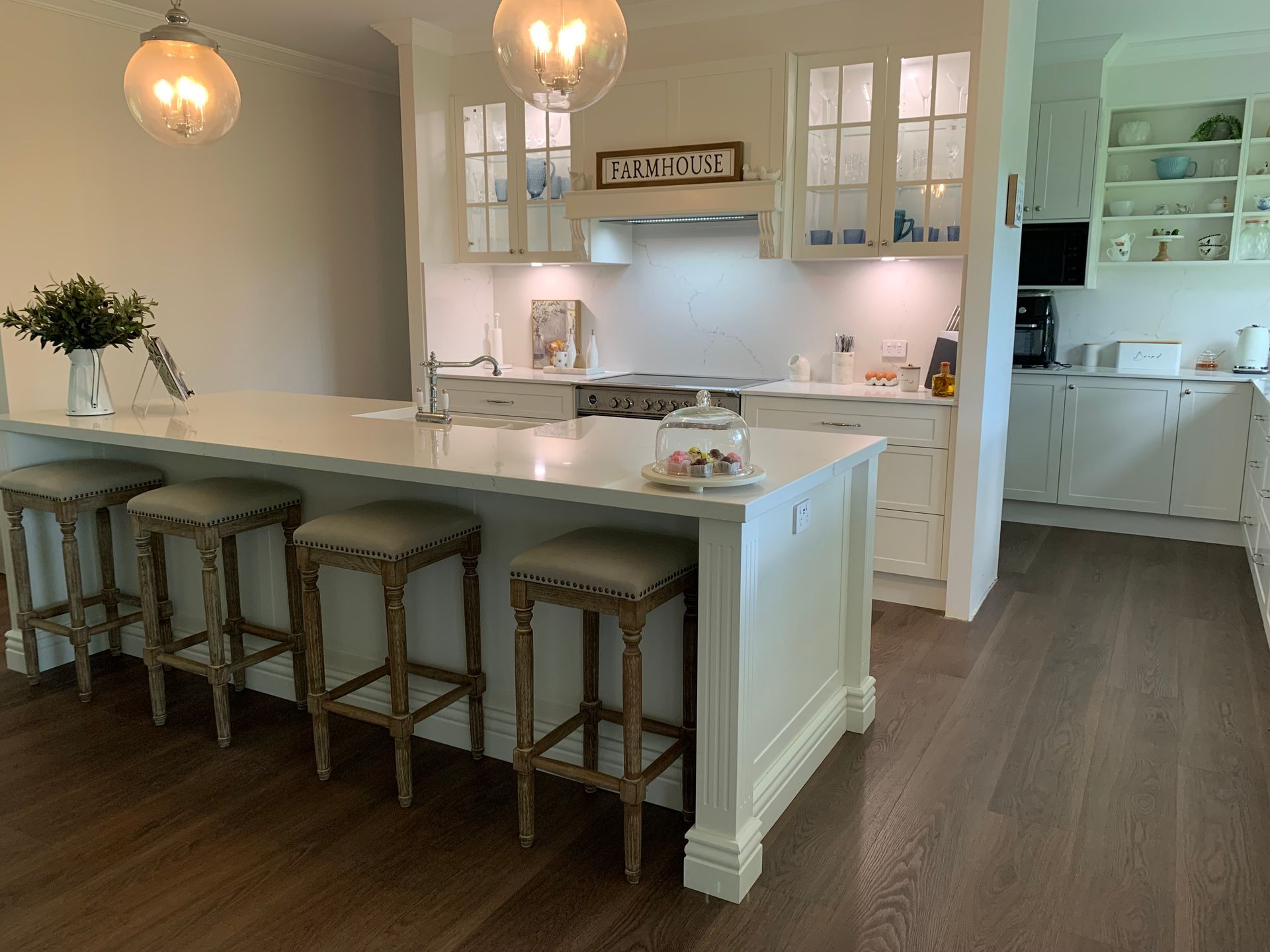 Modern White Kitchen With Island and Stools — The Kitchen Centre In Tuggerah, NSW