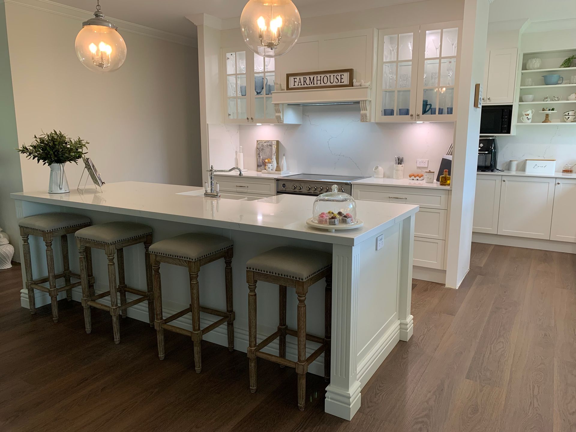 Modern White Kitchen With Island and Stools — The Kitchen Centre In Tuggerah, NSW