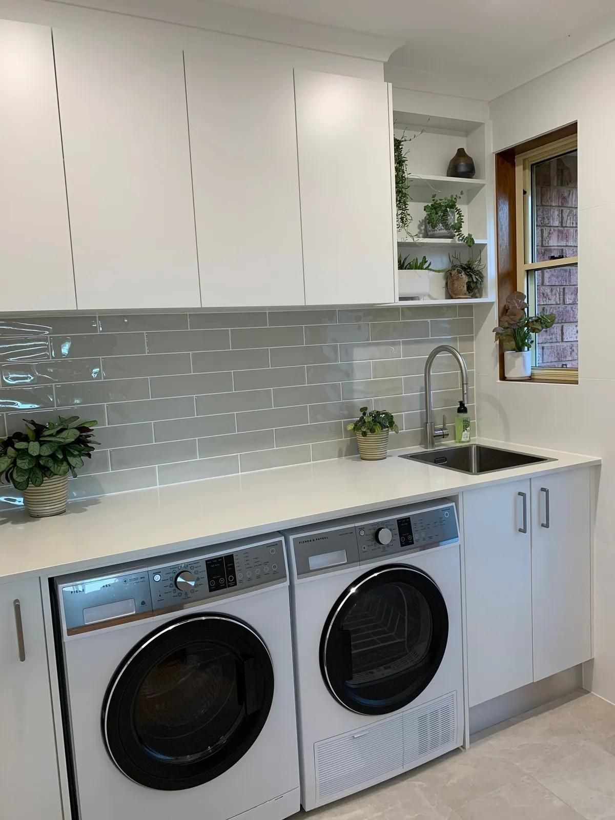 A Laundry Room With a Washer and Dryer and a Sink — The Kitchen Centre In Tuggerah, NSW