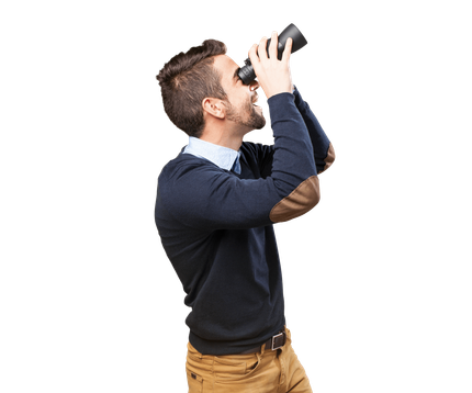 man looking through binoculars