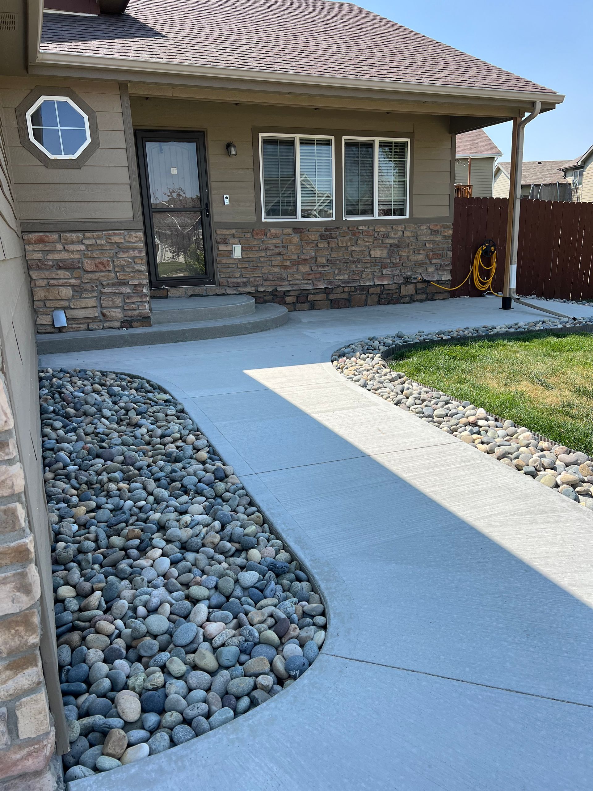 A house with a clock on the front of it
