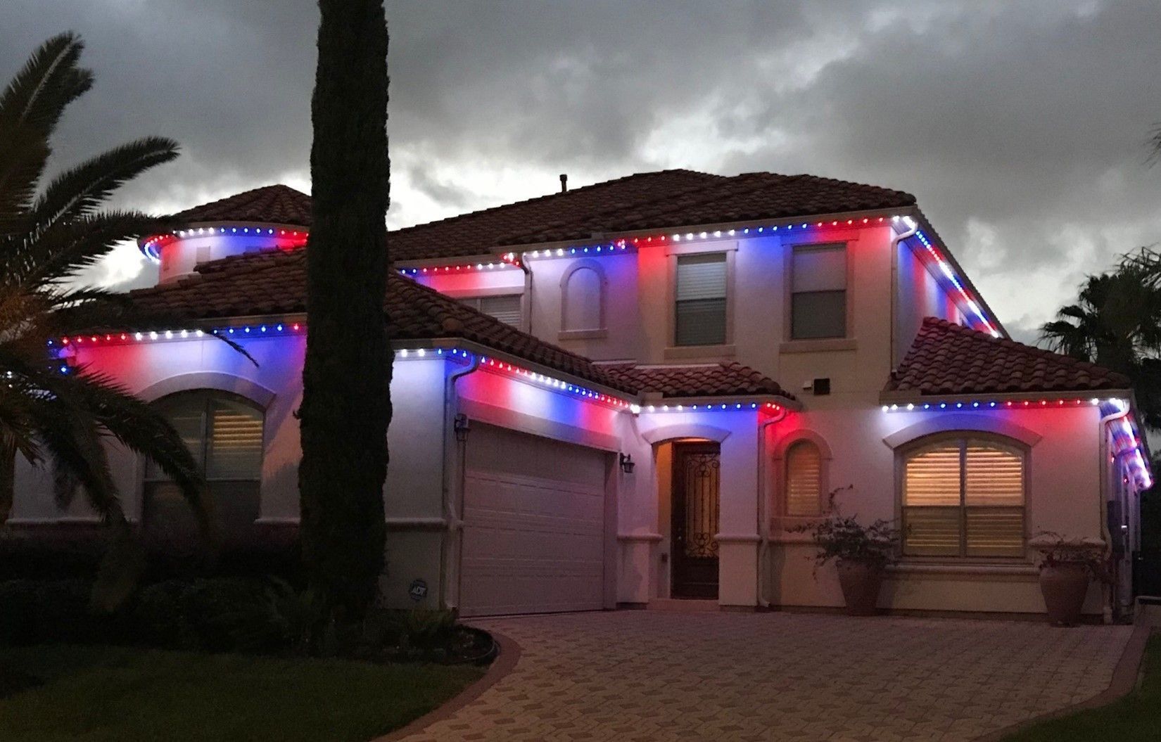 Big House with Red and Blue Lights — Tallahassee, FL — Tallahassee Trimlight