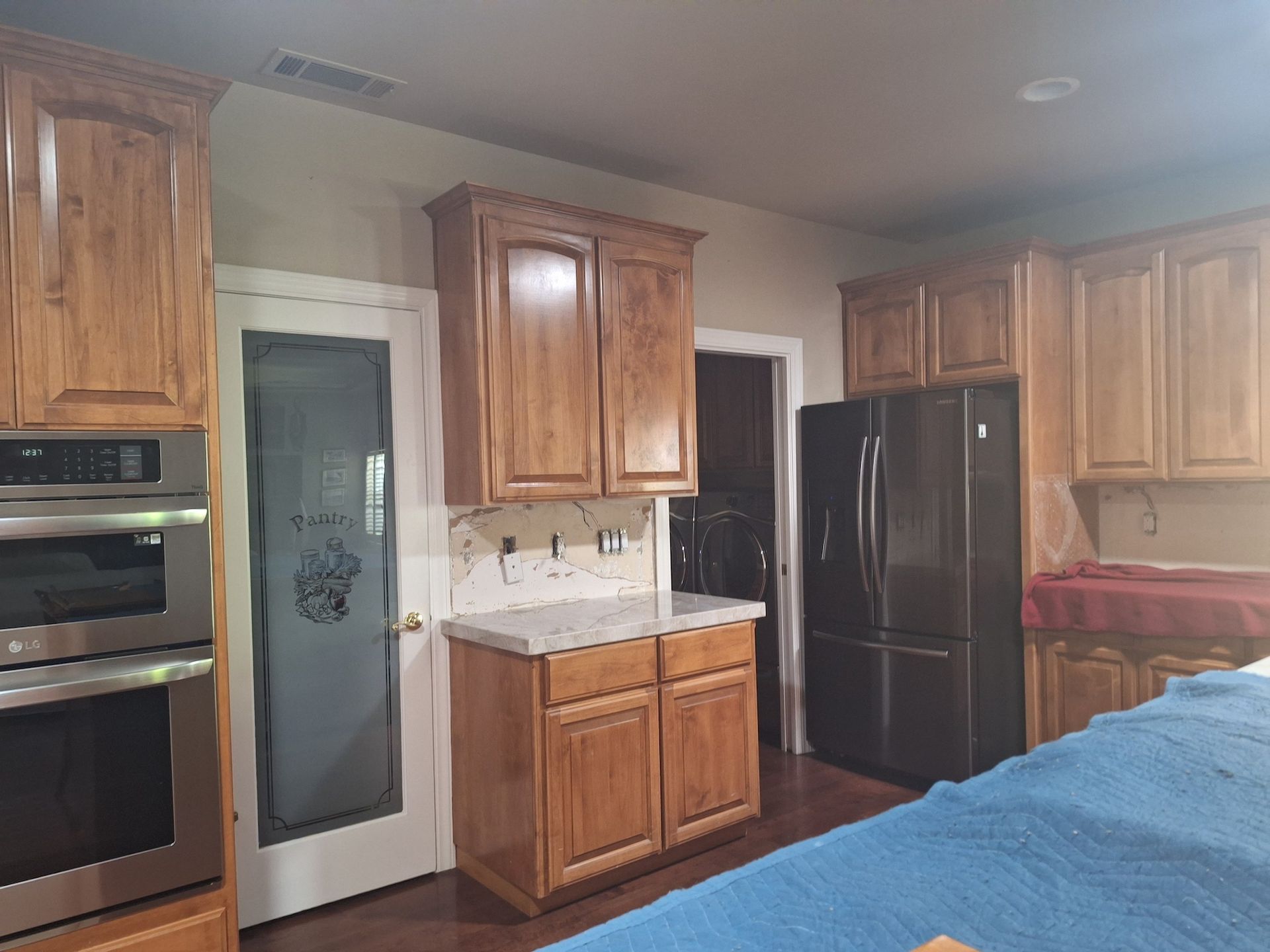 Before Cabinets in Kitchen Near Fridge