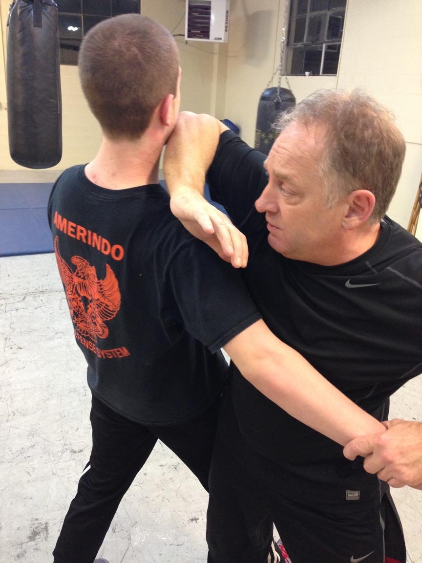 Kevin Schmitt performing a move from the Martial Art named Silat.