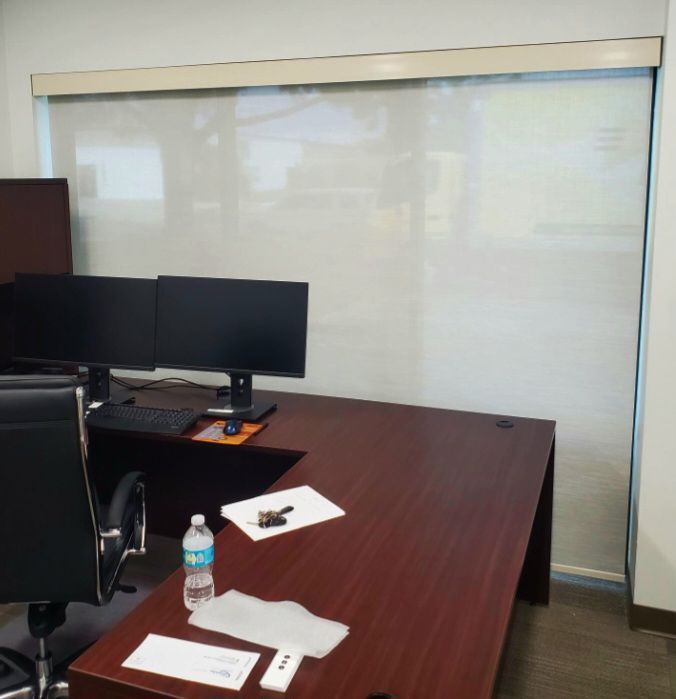 Home office interior with window shades Home office interior with window shades