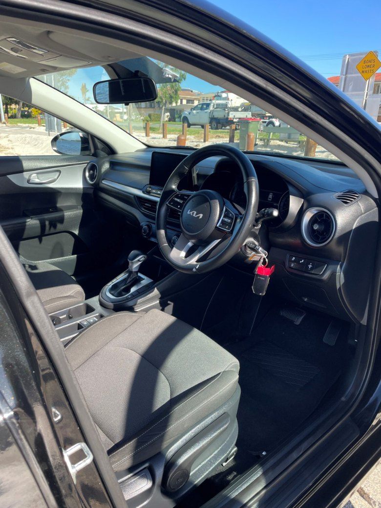 The Inside of a Black Car With the Door Open — Pelican Motors Service Centre In Caloundra West, QLD 
