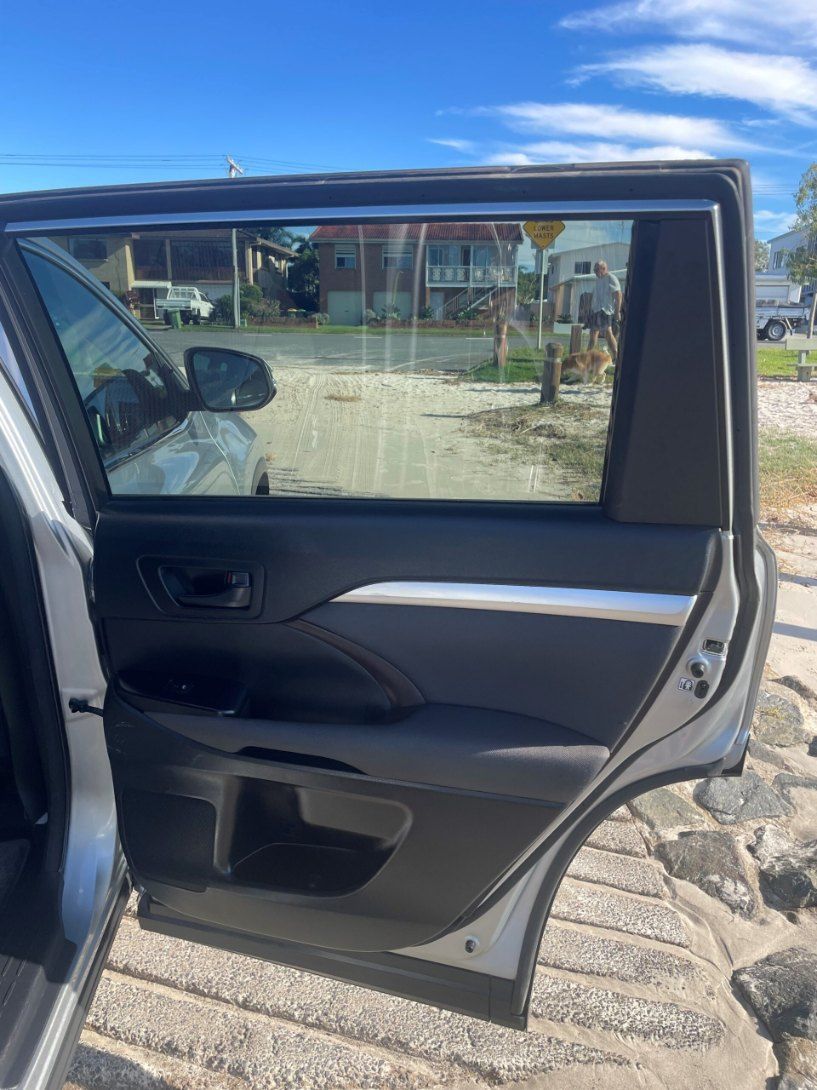 The Back Door of a Car is Open and the Window is Open — Pelican Motors Service Centre In Caloundra West, QLD 