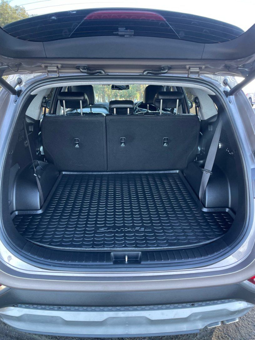 The Back of a Car With the Trunk Open and a Tray in It — Pelican Motors Service Centre In Caloundra West, QLD 