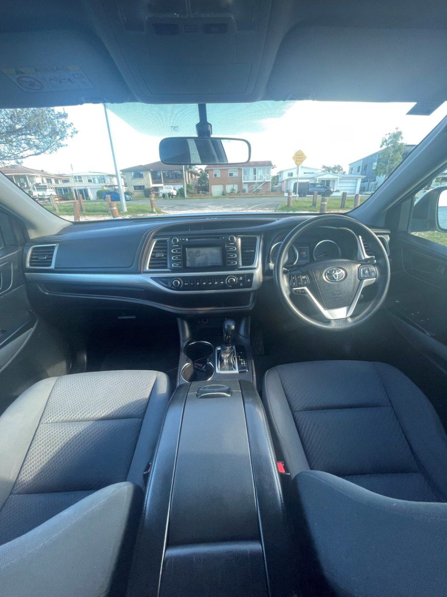The Inside of a Car With a Steering Wheel and Dashboard — Pelican Motors Service Centre In Caloundra West, QLD 