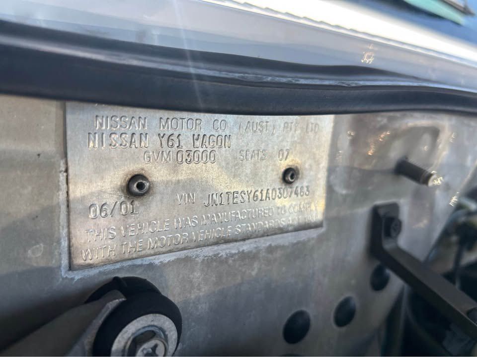 A Close Up of a License Plate on the Hood of a Car — Pelican Motors Service Centre In Caloundra West, QLD 