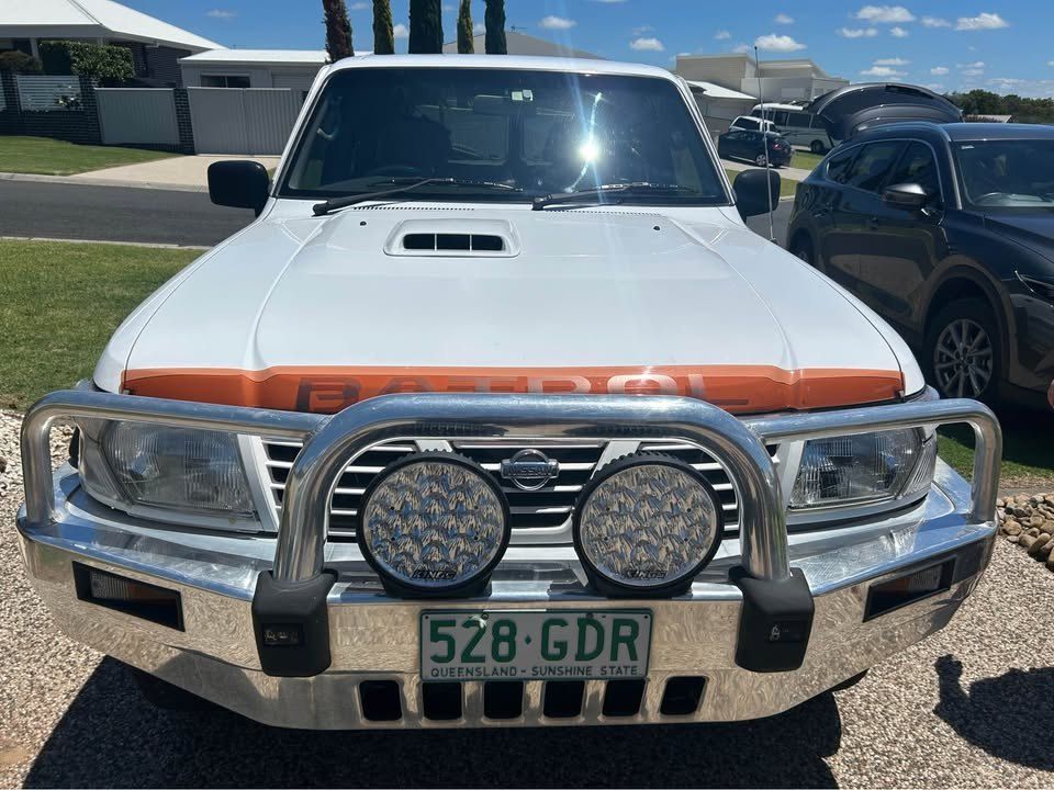 A White Truck With a License Plate That Says 528 Gdr — Pelican Motors Service Centre In Caloundra West, QLD 