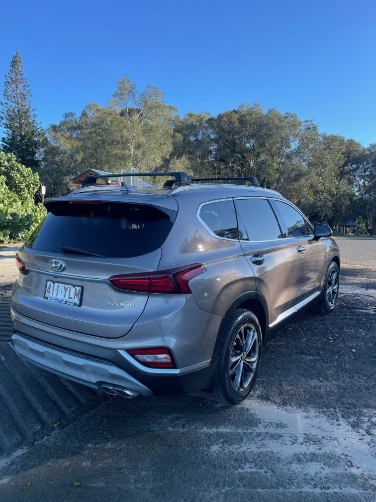 A Silver Hyundai Santa Fe is Parked in a Parking Lot — Pelican Motors Service Centre In Caloundra West, QLD 
