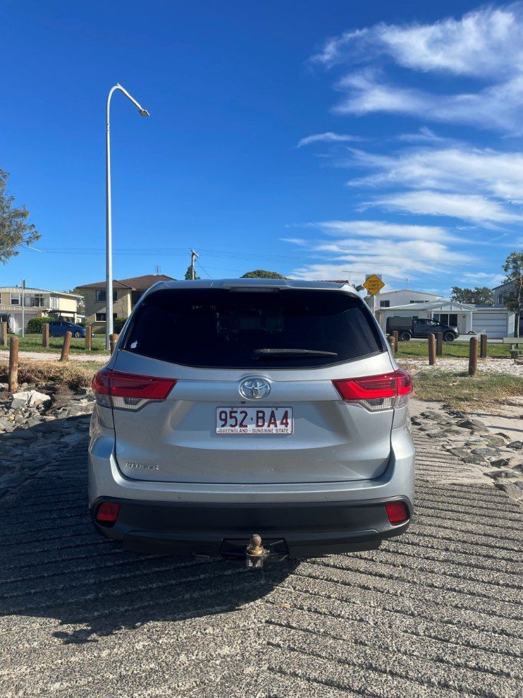 A Silver Toyota Highlander is Parked in a Parking Lot — Pelican Motors Service Centre In Caloundra West, QLD 