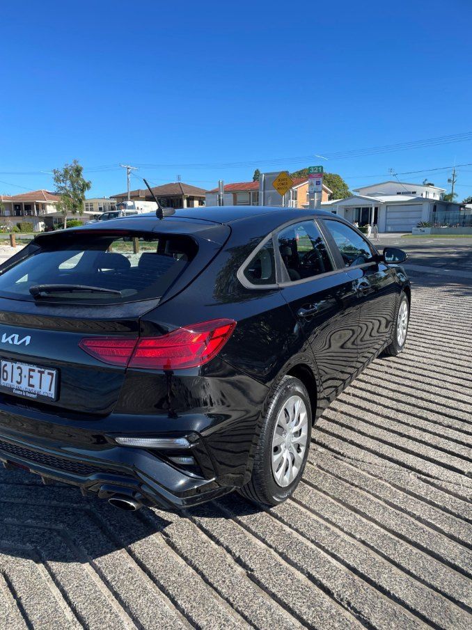 A Black Car is Parked in a Parking Lot on a Sunny Day — Pelican Motors Service Centre In Caloundra West, QLD 
