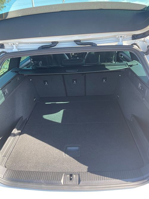 The Trunk of a White Car is Open and Empty — Pelican Motors Service Centre In Caloundra West, QLD 