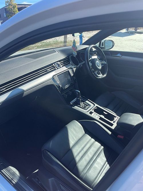 The Interior of a White Car With Black Seats and a Steering Wheel — Pelican Motors Service Centre In Caloundra West, QLD 
