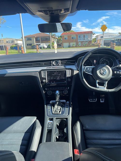 The Interior of a Car With a Steering Wheel and a Dashboard — Pelican Motors Service Centre In Caloundra West, QLD 