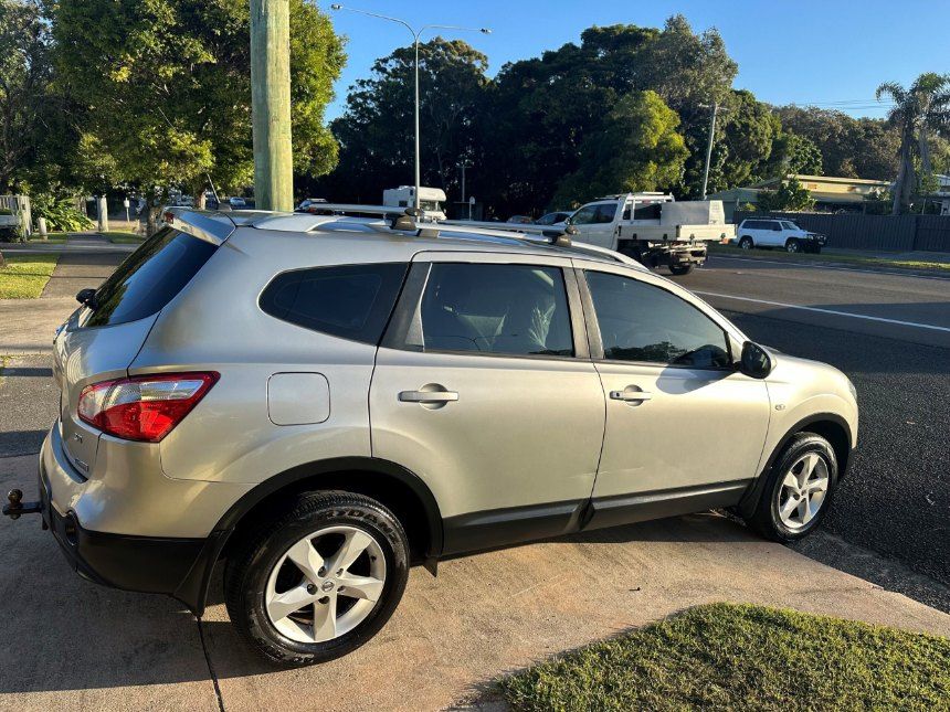 A Silver Suv is Parked on the Side of the Road — Pelican Motors Service Centre In Caloundra West, QLD 