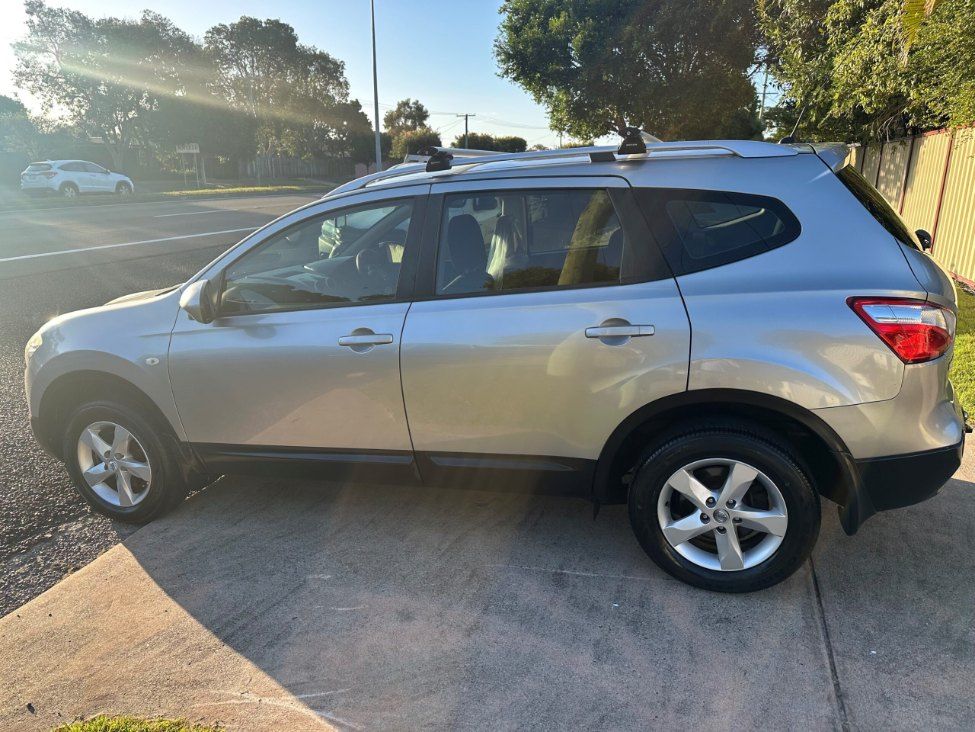 A Silver Suv is Parked on the Side of the Road — Pelican Motors Service Centre In Caloundra West, QLD 
