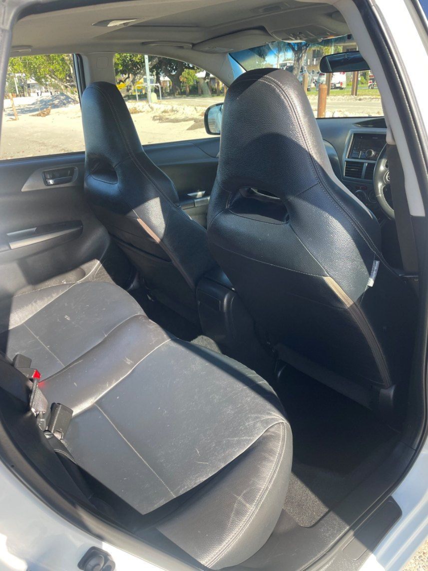 The Back Seat of a White Car With Black Seats — Pelican Motors Service Centre In Caloundra West, QLD 