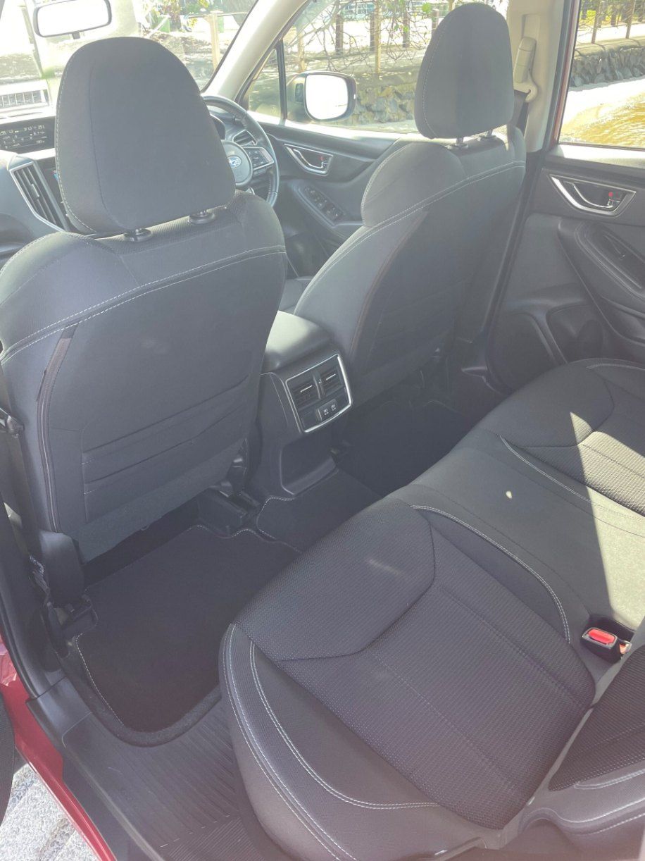 The Back Seat of a Red Car With Black Seats — Pelican Motors Service Centre In Caloundra West, QLD 