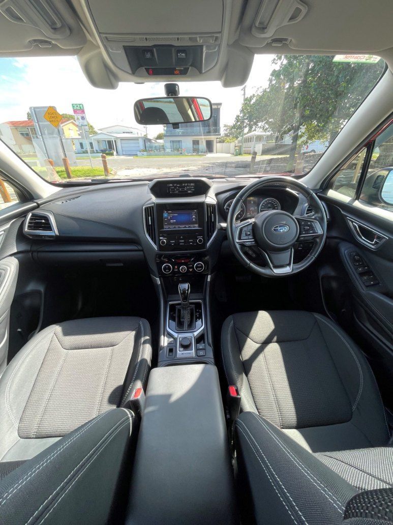 The Interior of a Car With a Steering Wheel and a Dashboard — Pelican Motors Service Centre In Caloundra West, QLD 