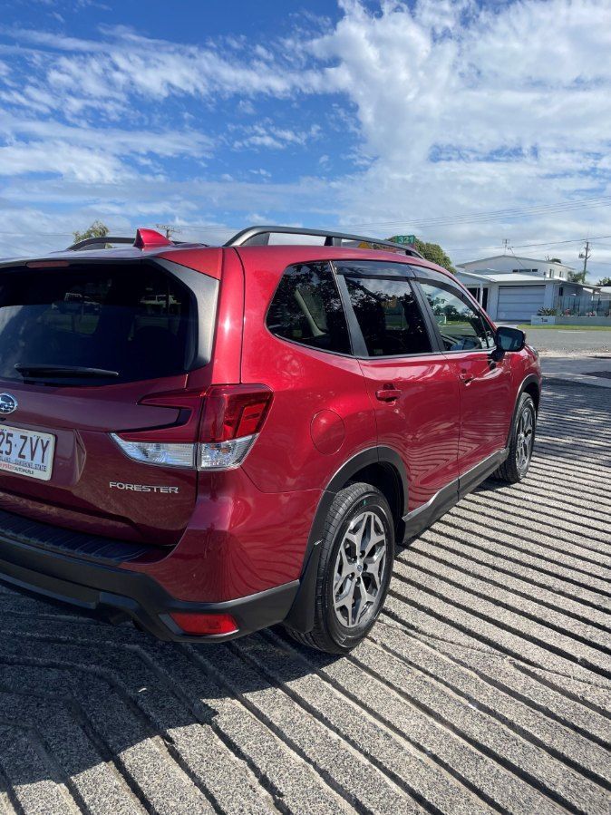 A Red Subaru Forester is Parked in a Parking Lot — Pelican Motors Service Centre In Caloundra West, QLD 