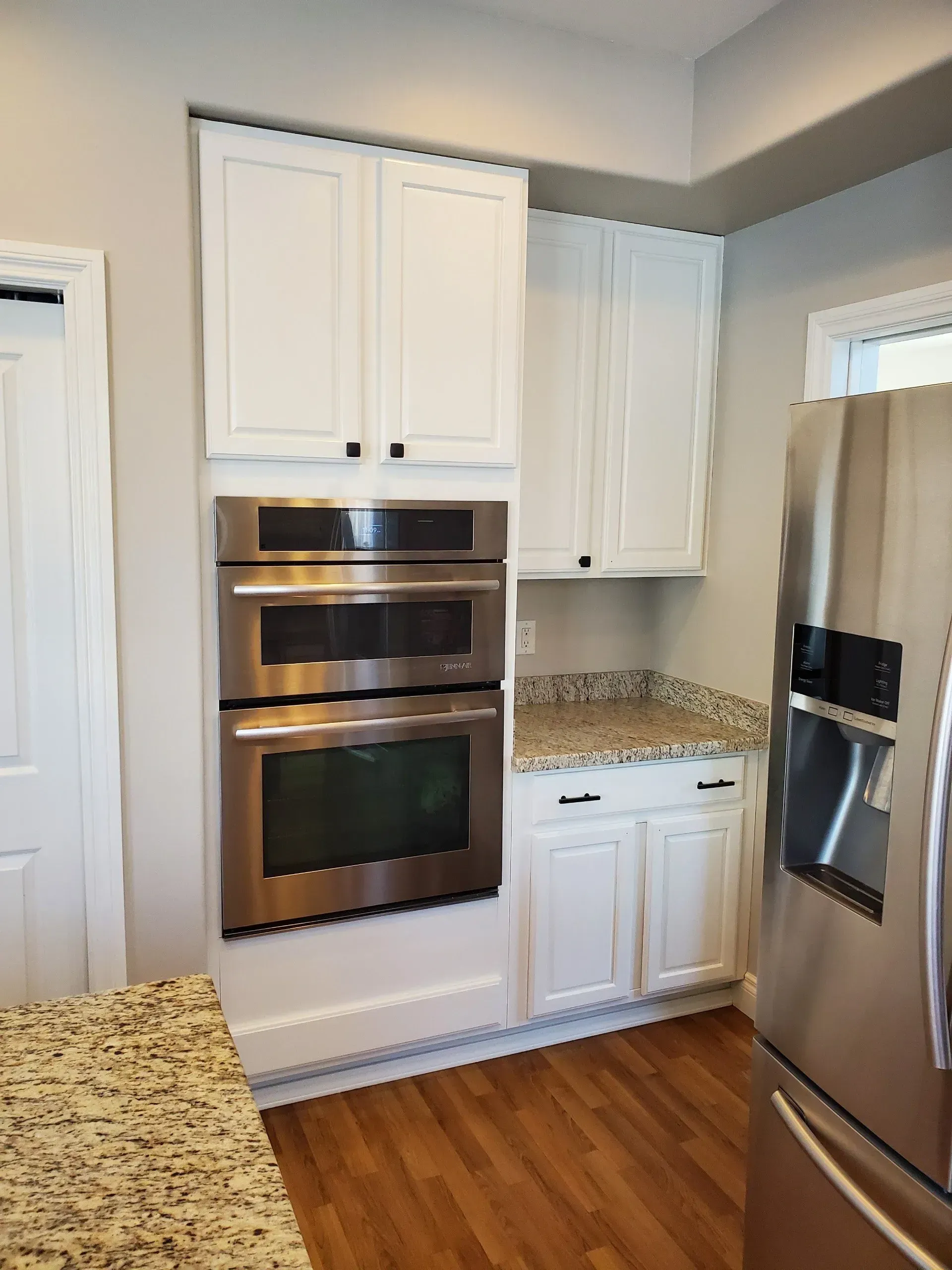 Painted White Kitchen Cabinets — Anchorage, AK — Alaska Painting & Construction LLC