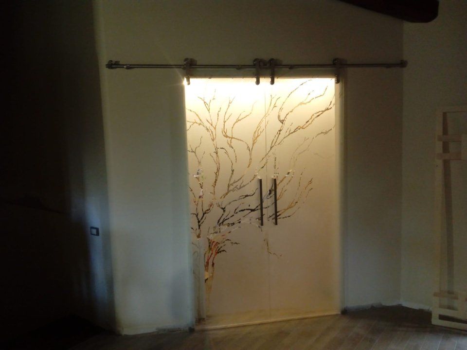 porta scorrevole in vetro