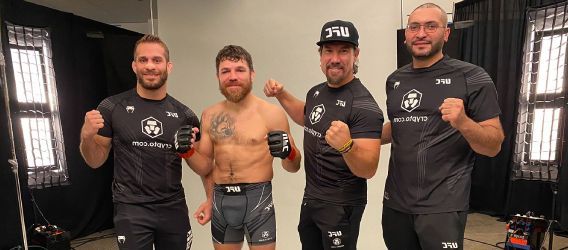 Pharaohs Muay Thai students practicing kicks during class
