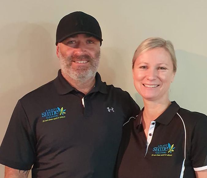 A Man and a Woman Are Standing Next to Each Other — A Place 2 Shine In Chisholm, NSW