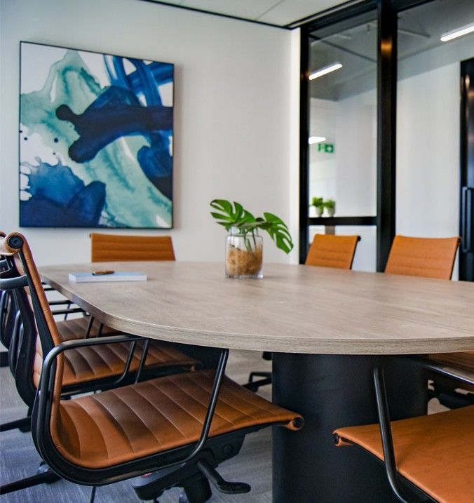 A Conference Room With a Table and Chairs on the Wall — A Place 2 Shine In Chisholm, NSW