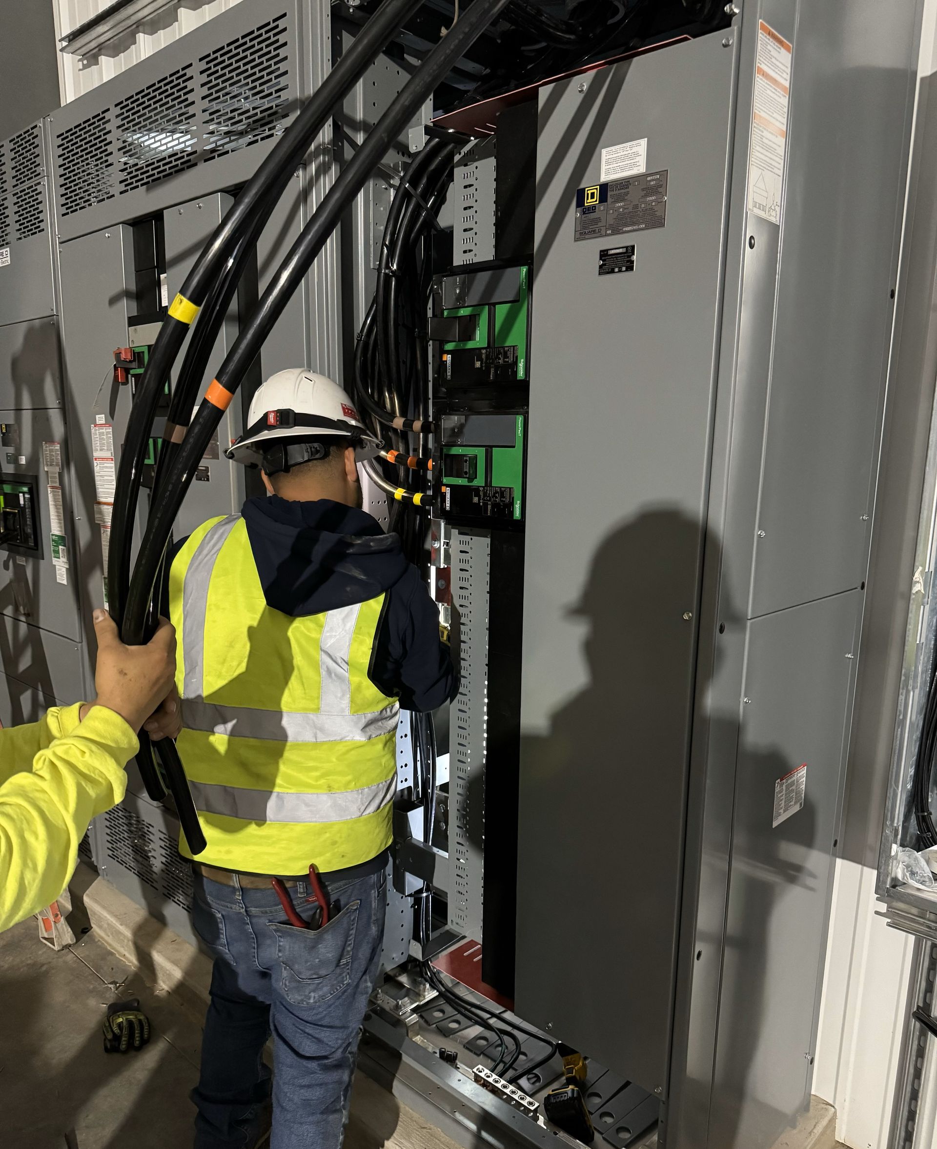 A Man Working On An Electrical Box - Woodward, OK - Moyer Electric