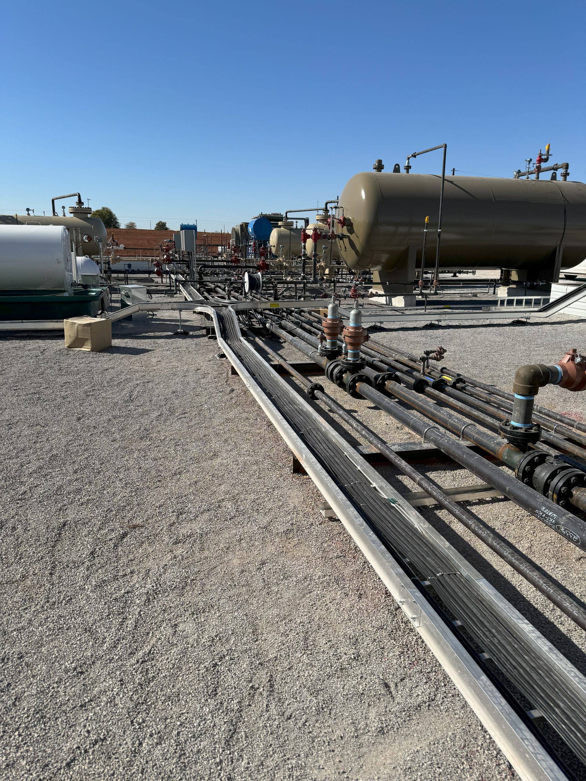 Pipes Lined Up On The Ground - Woodward, OK - Moyer Electric