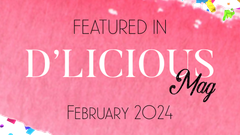 A pink sign that says ' featured in d ' licious mag ' on it