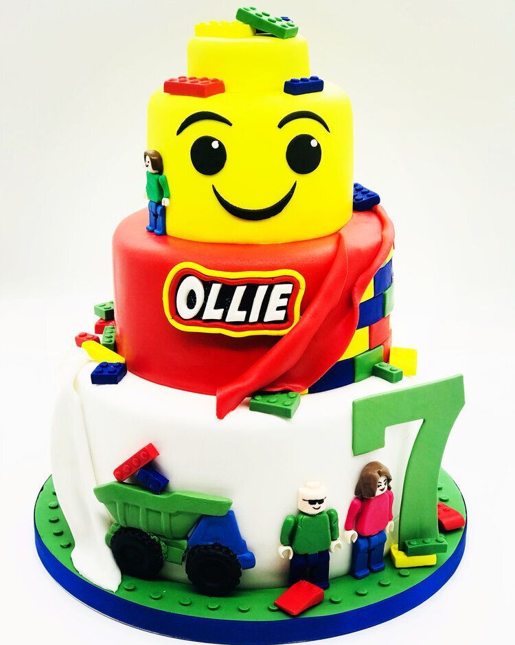 A lego cake with the name ollie on it