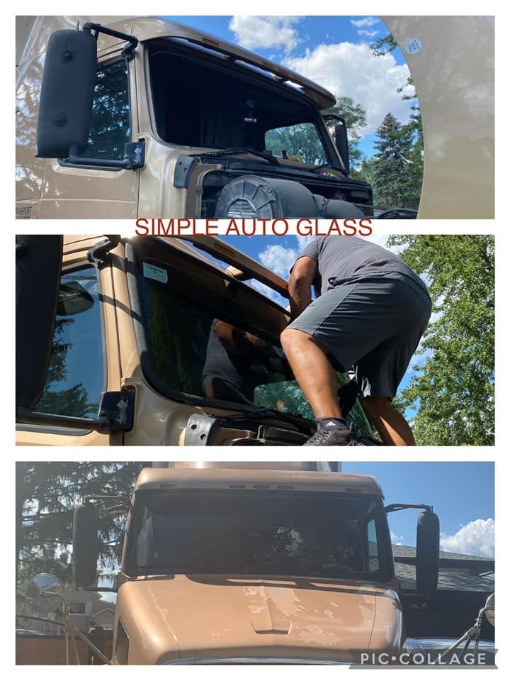 A man is installing a simple auto glass on a truck.