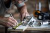 handyman measuring wood