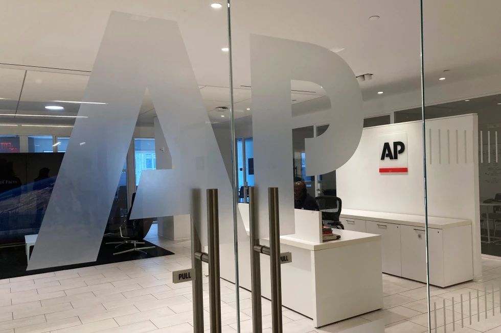 The Associated Press logo: black capital letters "AP" centered above a solid red horizontal rectangle.