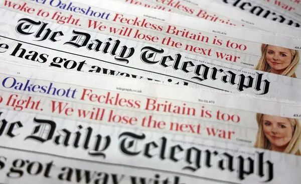 Newspaper headlines "The Daily Telegraph," with text about Britain and war.