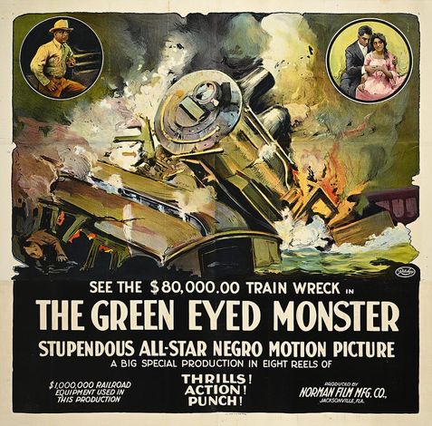 Vintage poster of a train wreck with smoke and flames; text reads “The Green Eyed Monster.”