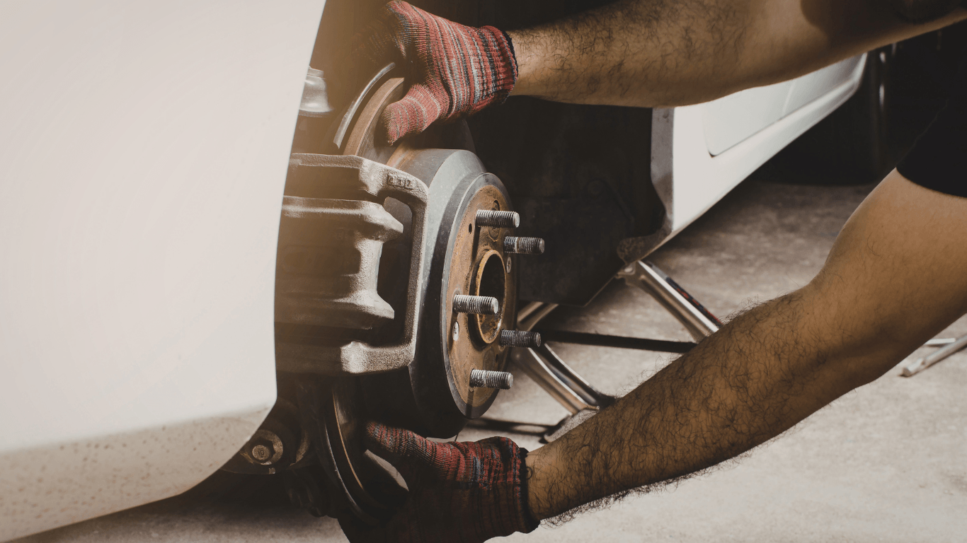 a mechanic doing a brake repair job