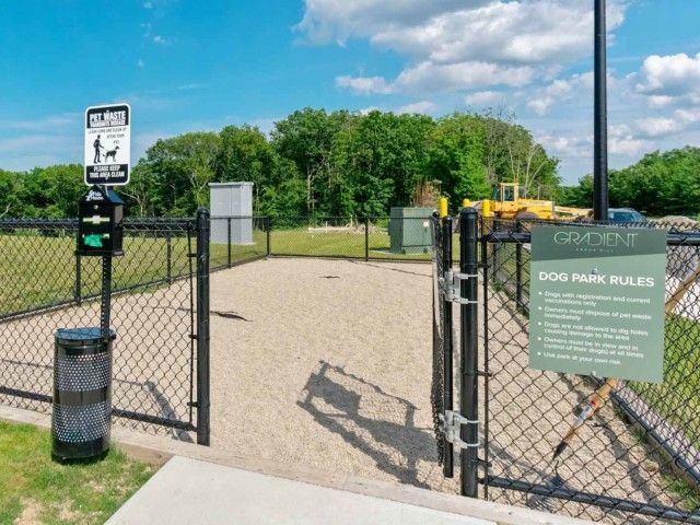 Gradient apartment community bark park.