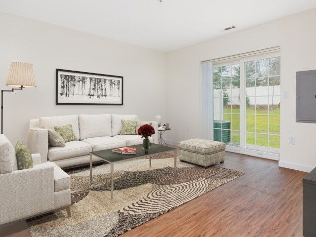 Gradient apartment living room with an exit to the balcony.