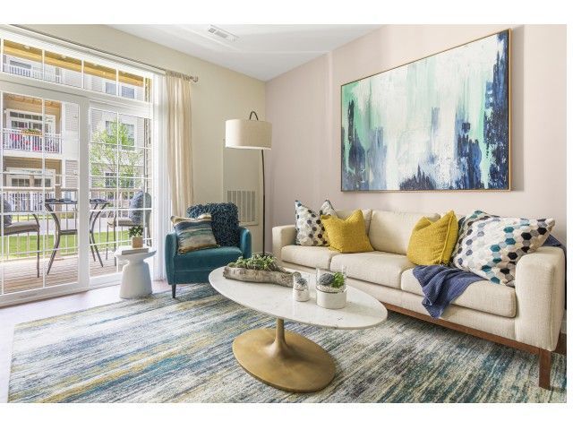 Gradient apartment living room with modern furniture.