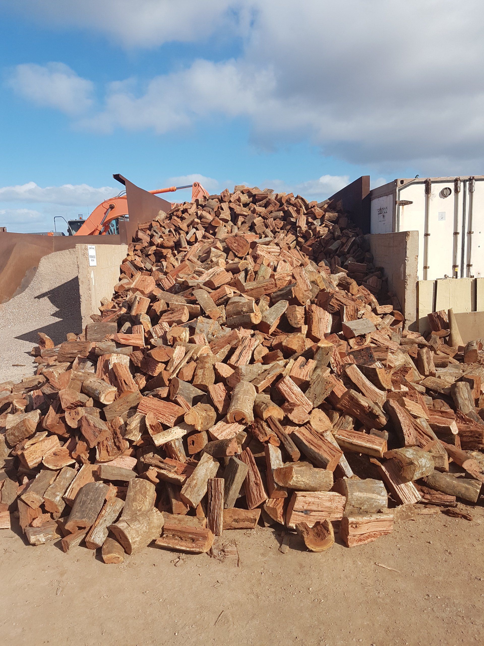 pile of redgum wood