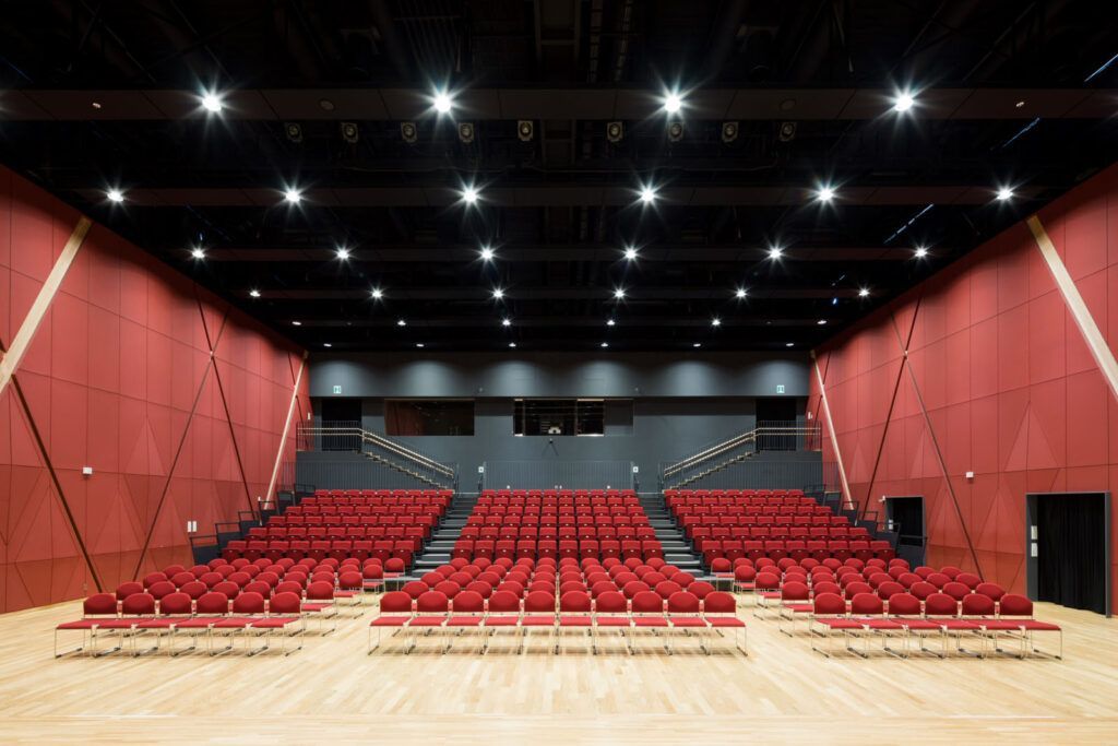 A full front view of the fixed and portable seating at Rikuzentaka Multi-Purpose Community Hall.