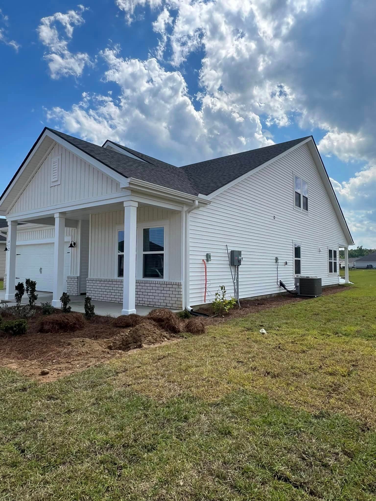 A large house with a quality gutter installation in Mullins SC